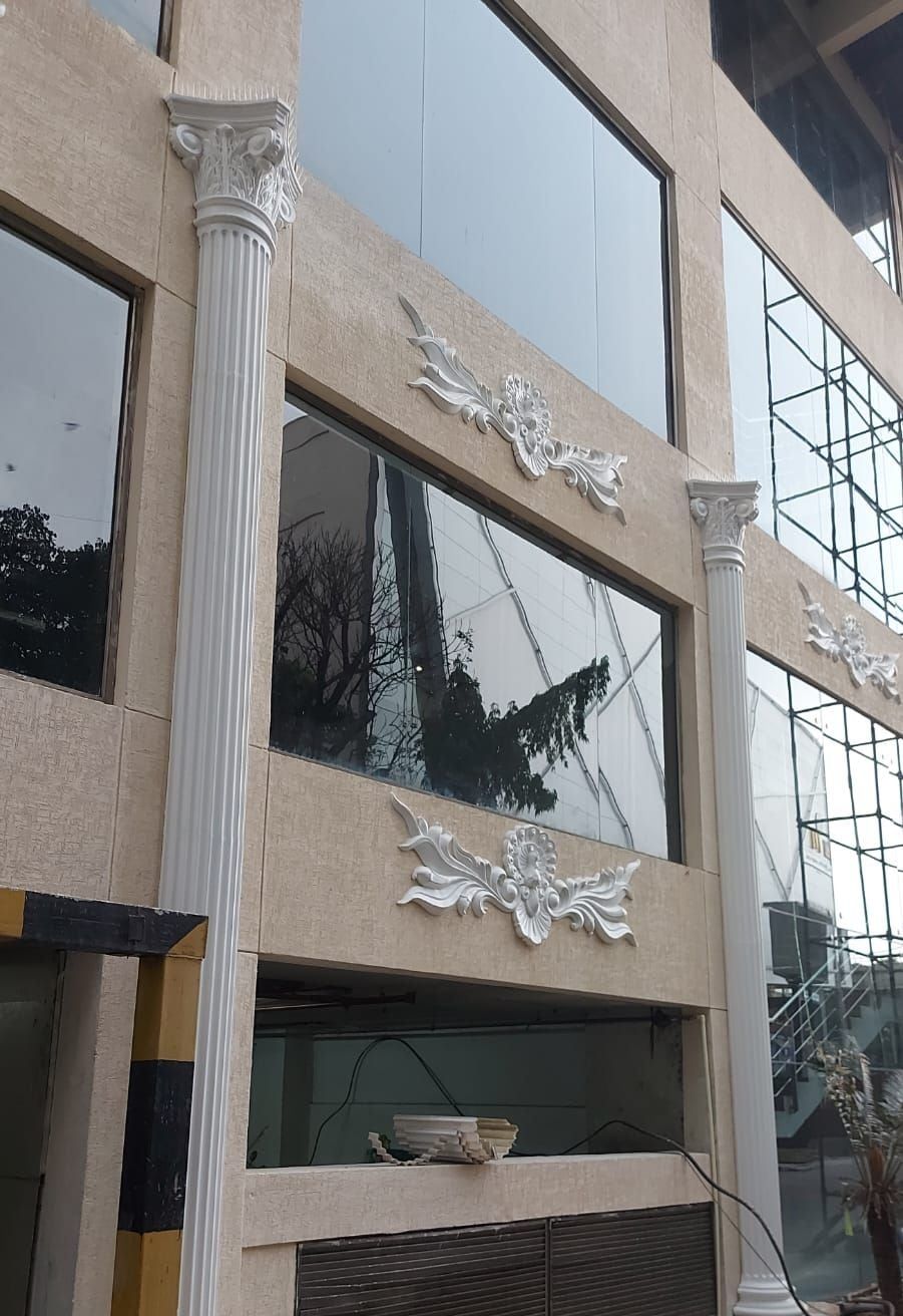 The same ornament repeated on each floor of the side elevation — 1 MG Lido Mall, Bangalore, Karnataka