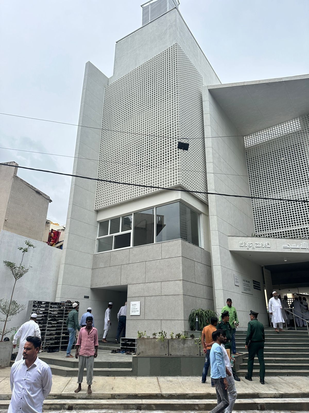 The entrance, with the angled bays and their screens — Bismilla Green Masjid